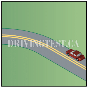 northwest-territories car - If you are driving around a curve or corner, what is an important thing to remember?