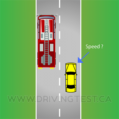 Test 2 - What speed do you have to be driving at to get fined while driving on a road with a 80 km/h speed limit for passing a firetruck that is handling a car fire?