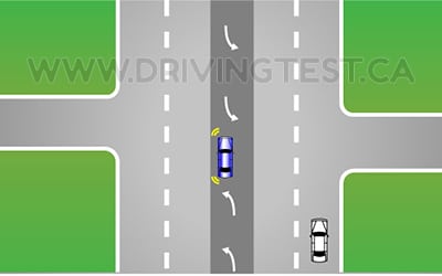 Test 2 - When should you join the lane if you are trying to enter a two-way left turning lane to access a driveway?